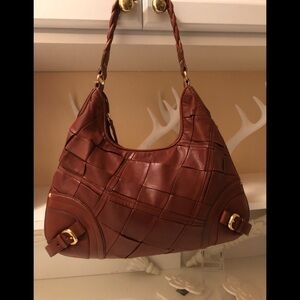 Elliott Lucca poor leather purse .